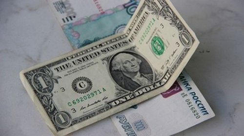 От чего зависит курс рубля к доллару?
