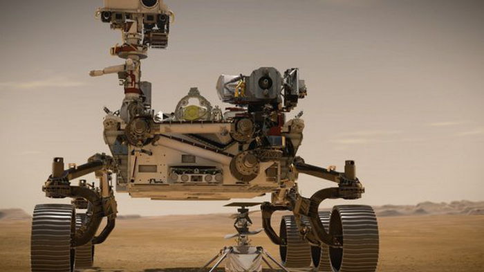 Уникальное фото: парящий кран спускает марсоход Perseverance на поверхность Марса
