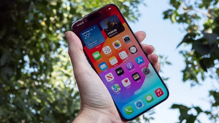 Apple iPhone 15 Pro Max in hand at an angle